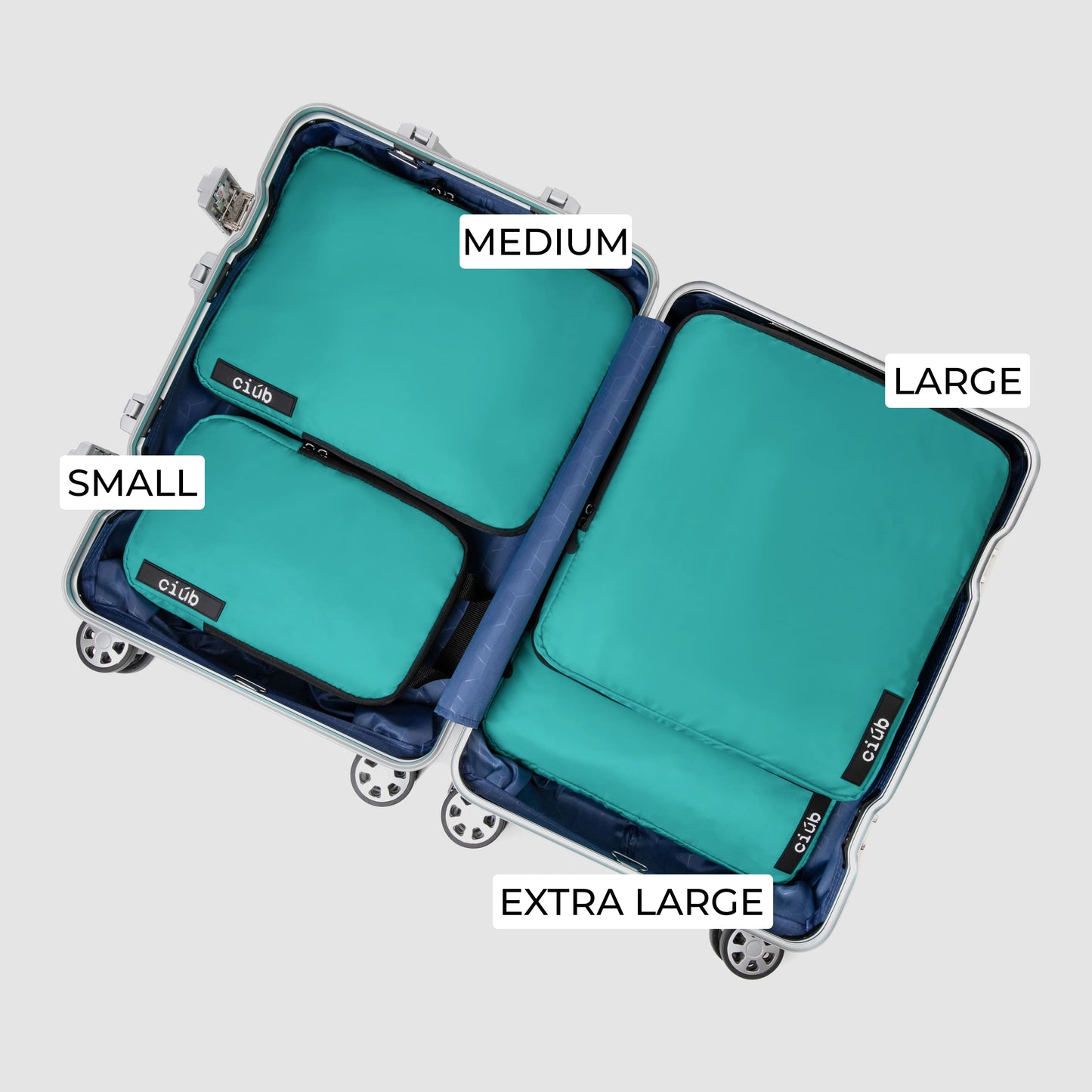 4 green ciub compression packing cubes, in a suitcase formerly easypackpro