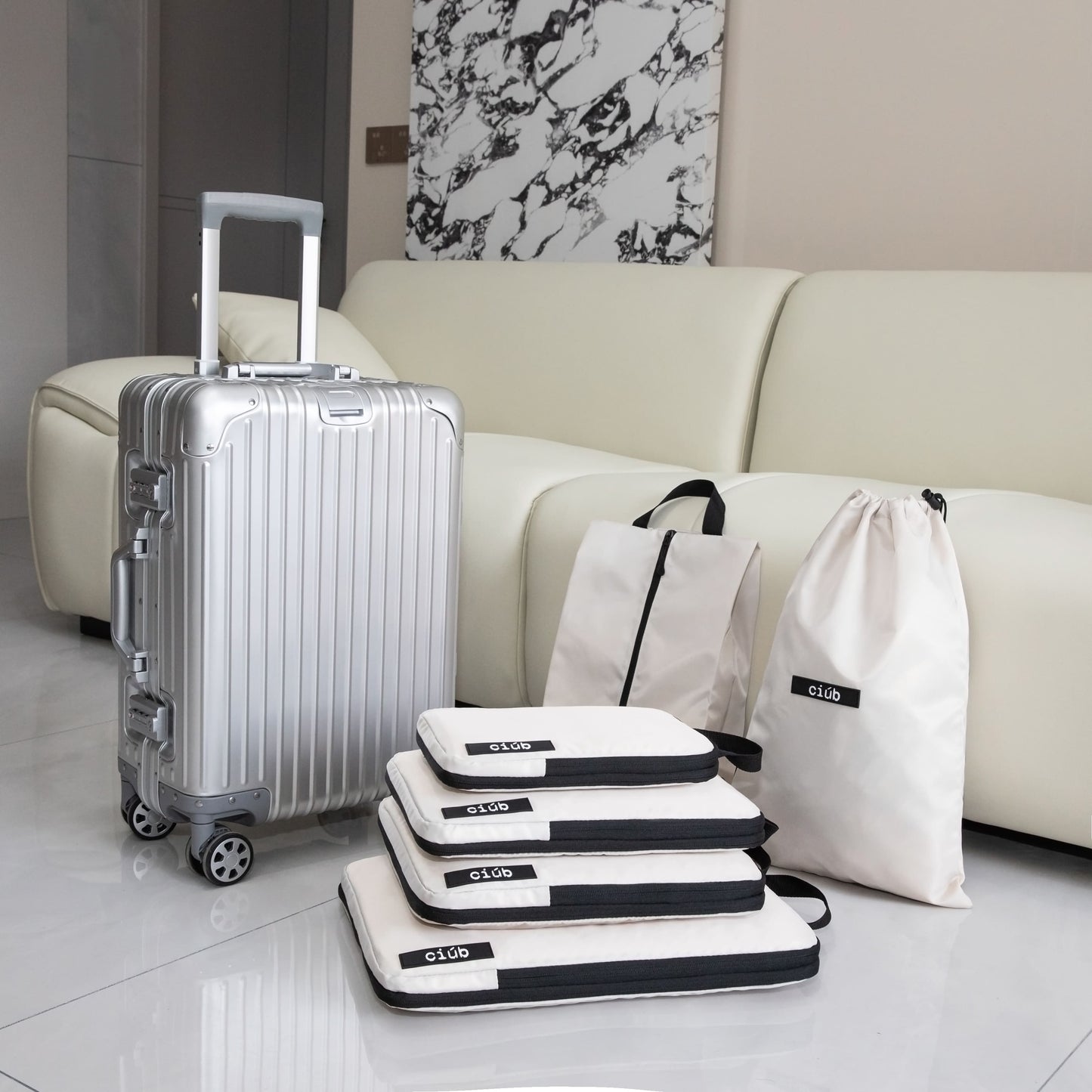 Beige packing cubes for organising a home